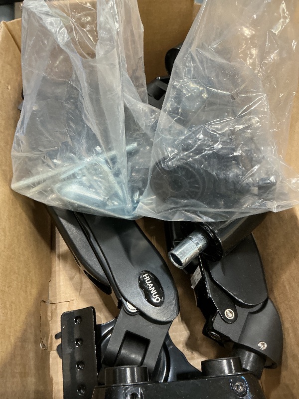 Photo 1 of ***SEE CLERK COMMENTS*** HUANUO Dual Monitor Stand - Full Adjustable Monitor Desk Mount Swivel Vesa Bracket with C Clamp, Grommet Mounting Base for 13 to 32 Inch Computer Screens - Each Arm Holds 4.4 to 19.8lbs