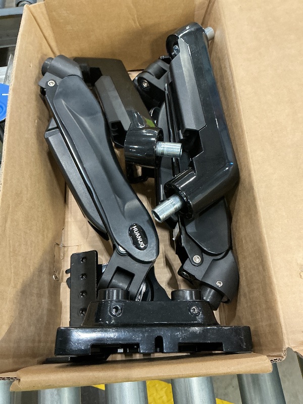 Photo 1 of ***SEE CLERK COMMENTS*** HUANUO Dual Monitor Stand - Full Adjustable Monitor Desk Mount Swivel Vesa Bracket with C Clamp, Grommet Mounting Base for 13 to 32 Inch Computer Screens - Each Arm Holds 4.4 to 19.8lbs