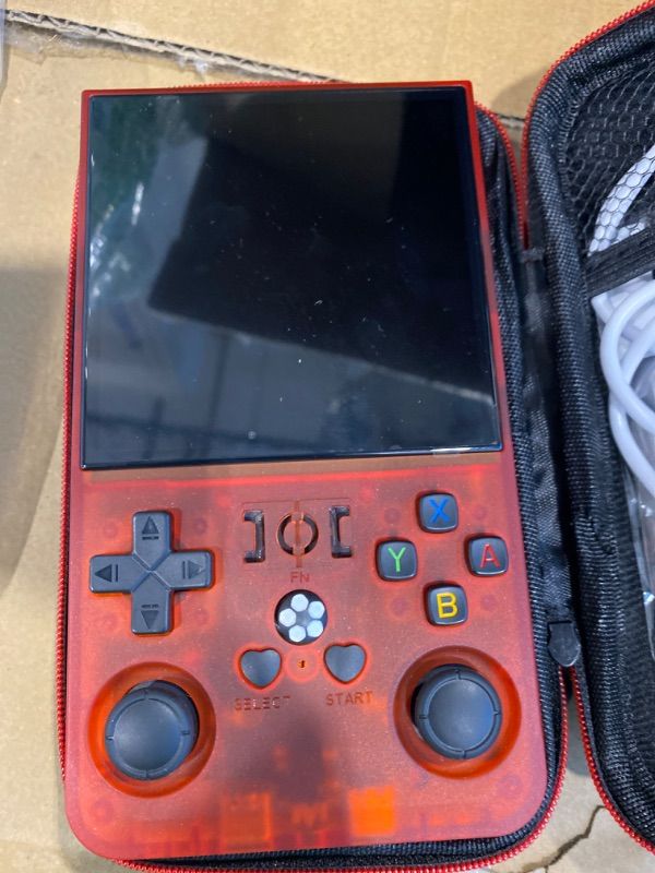 Photo 1 of **UNTESTED**
R36MAX Retro Handheld Game Console,64GB Open Source System Support 30+ Emulator Console,4.0 Inch IPS Screen Retro Gaming Console,4000mAh Battery,Portable Video Game Console for Christmas (Red)