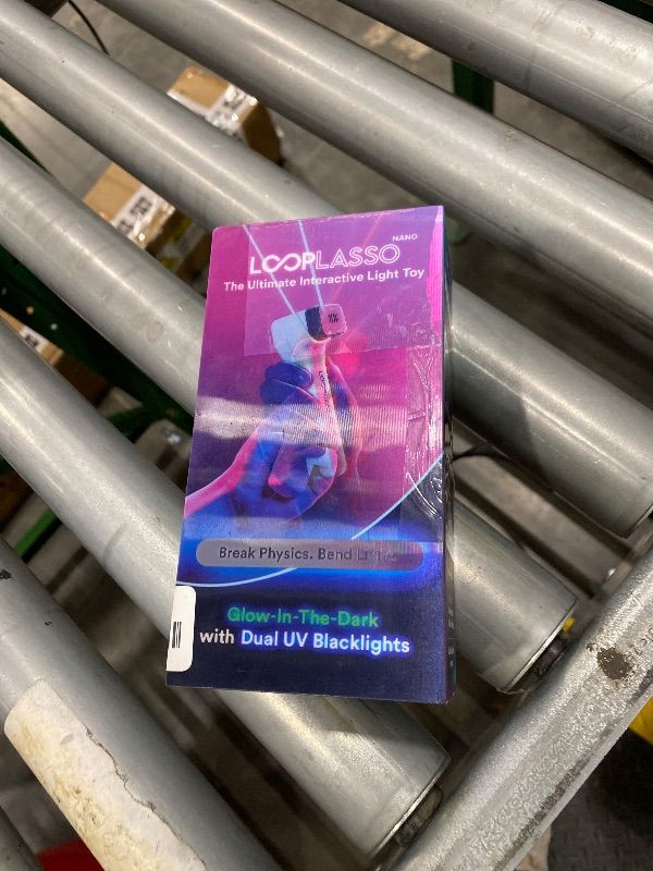 Photo 1 of **USED & MISSING PARTS**
Loop Lasso NANO Glow in the Dark Rave Toys with Built-in UV Blacklight - Interactive Rope Launcher STEM Toy - Viral Flow and String Shooter Toy for Kids and Adults