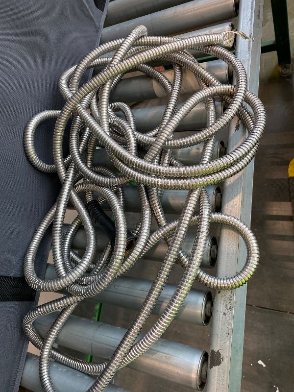 Photo 1 of *Major Damaged* Metal Garden Hose 50 ft – 304 Stainless Steel Water Hose with Nozzle Sprayer, Garden Hoses Flexible, Lightweight, No Kink, Heavy Duty for Outdoor (50 ft)