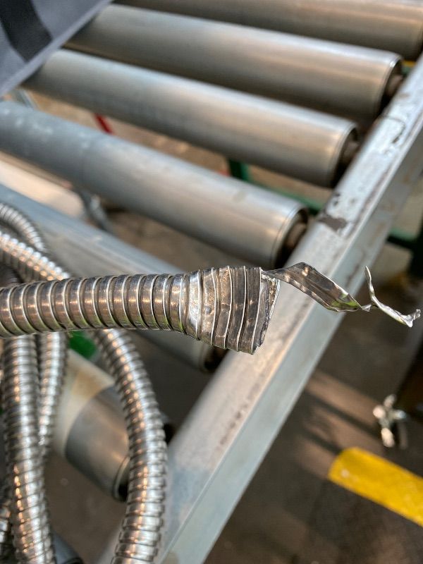 Photo 1 of *Major Damaged* Metal Garden Hose 50 ft – 304 Stainless Steel Water Hose with Nozzle Sprayer, Garden Hoses Flexible, Lightweight, No Kink, Heavy Duty for Outdoor (50 ft)