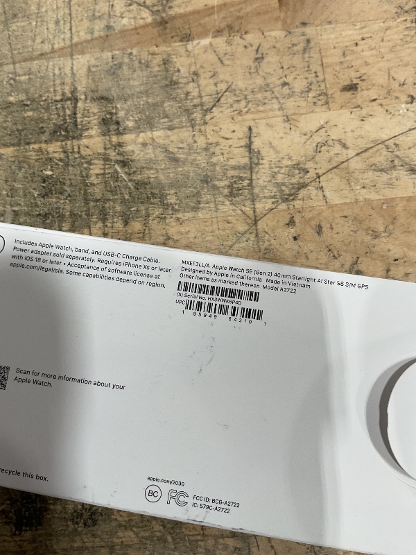 Photo 1 of  Apple Watch SE (2nd Gen) [GPS 40mm] Smartwatch with Starlight Aluminum Case with Starlight Sport Band S/M. Fitness and Sleep Trackers, Crash Detection, Heart Rate Monitor, Retina Display
