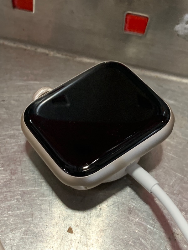Photo 1 of  Apple Watch SE (2nd Gen) [GPS 40mm] Smartwatch with Starlight Aluminum Case with Starlight Sport Band S/M. Fitness and Sleep Trackers, Crash Detection, Heart Rate Monitor, Retina Display