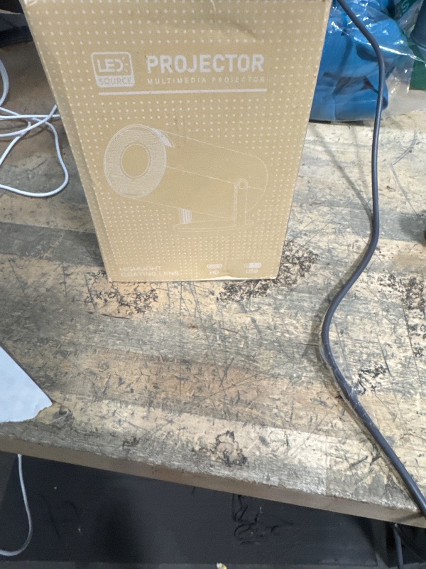 Photo 1 of ***(PARTS ONLY/ MAJOR DAMAGE/ NON FUNCTIONAL)***HY300 PRO Mini Portable Projector, Support 4K 1080P with Dual-Band WIFI6 5G Wireless 5.0 Bluetooth Android 11,160 ANSI,180° Rotatable, Auto Keystone Correction, 35"-130" Screen Video Projector