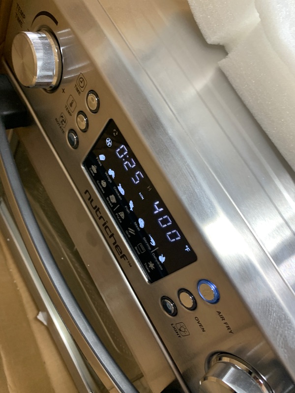 Photo 1 of ****PARTS ONLY*** 
NutriChef 26L Electric Air Fryer Oven | 1700W Countertop Rotisserie & Air Fryer | 360° Rotating Feature | 10 Digital Menu Presets | Includes Drip Tray, Air Frying Basket & Bake Rack 15x16x14 (Silver)