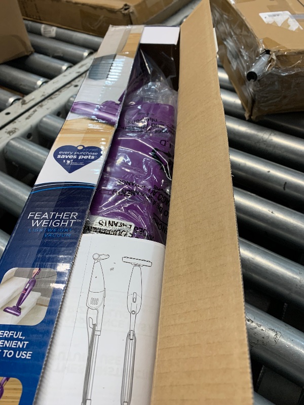 Photo 1 of ***(MAJOR DAMAGE/ SEE NOTES)***Bissell 20334 Featherweight Stick Vacuum Lightweight Bagless Vacuum, Purple