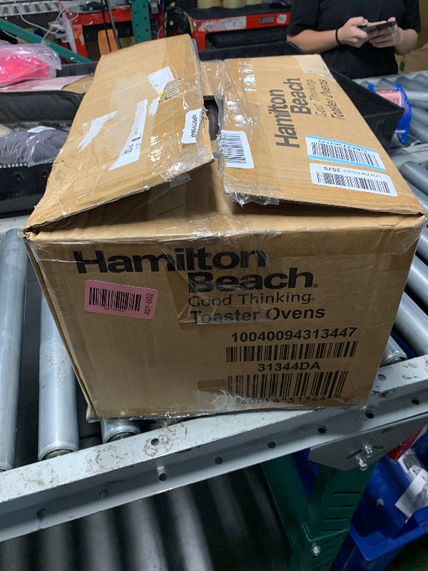 Photo 1 of Hamilton Beach Easy Reach 4-Slice Countertop Toaster Oven With Roll-Top Door, 1200 Watts, Fits 9” Pizza, 3 Cooking Functions for Bake, Broil and Toast, Silver (31344DA)