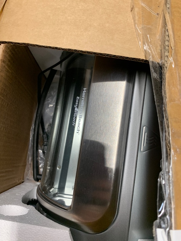 Photo 1 of Hamilton Beach Easy Reach 4-Slice Countertop Toaster Oven With Roll-Top Door, 1200 Watts, Fits 9” Pizza, 3 Cooking Functions for Bake, Broil and Toast, Silver (31344DA)