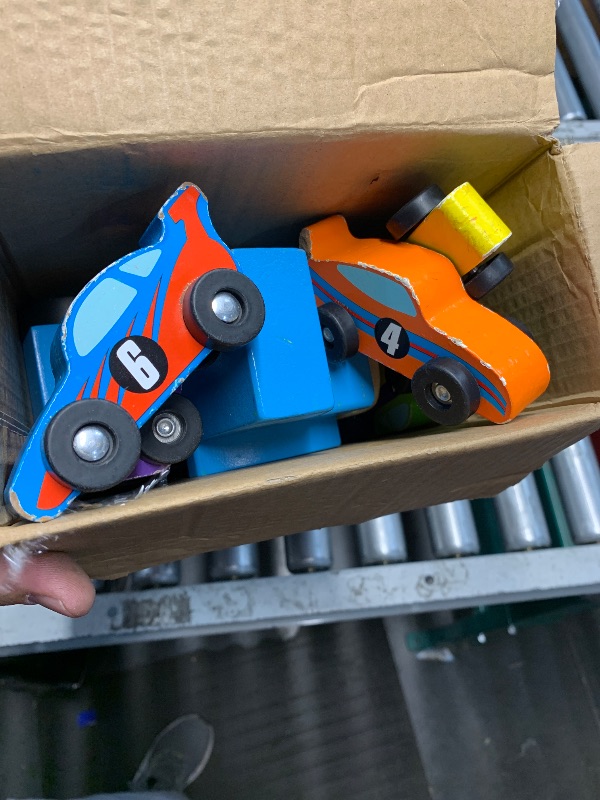 Photo 1 of Melissa & Doug Mega Race-Car Carrier - Wooden Tractor and Trailer with 6 Unique Race Cars