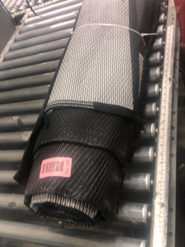 Photo 1 of (minor usages) HappyTrends Outdoor Rug Reversible Portable Plastic Straw Camping Rugs for Outside RV,Large Waterproof Outdoor Area Rugs for Patio,Deck,Porch,Balcony(5'x 8',White&Gray)