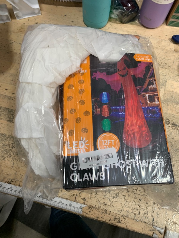 Photo 1 of 12FT Giant Halloween Inflatables Ghost with 3-Colored Flame Rotation LED Lights, Huge Spooky Halloween Decoration Outdoor Large Halloween Blow Up Yard Decorations Tall Blow-ups for Lawn Party (1PCS)