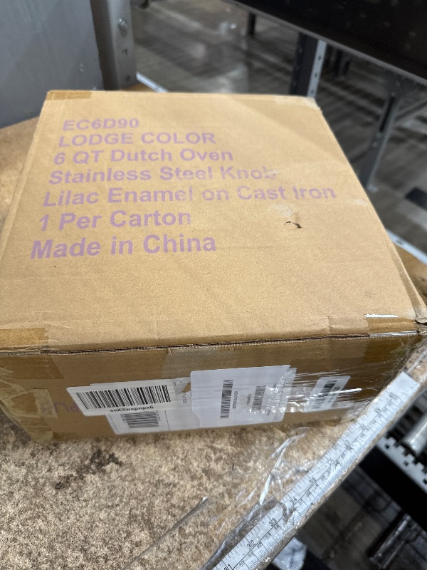 Photo 1 of **HAS MATERIAL/PAINT CHIPS** Lodge 6 Quart Enameled Cast Iron Dutch Oven with Lid – Dual Handles – Oven Safe up to 500° F or on Stovetop - Use to Marinate, Cook, Bake, Refrigerate and Serve – Red