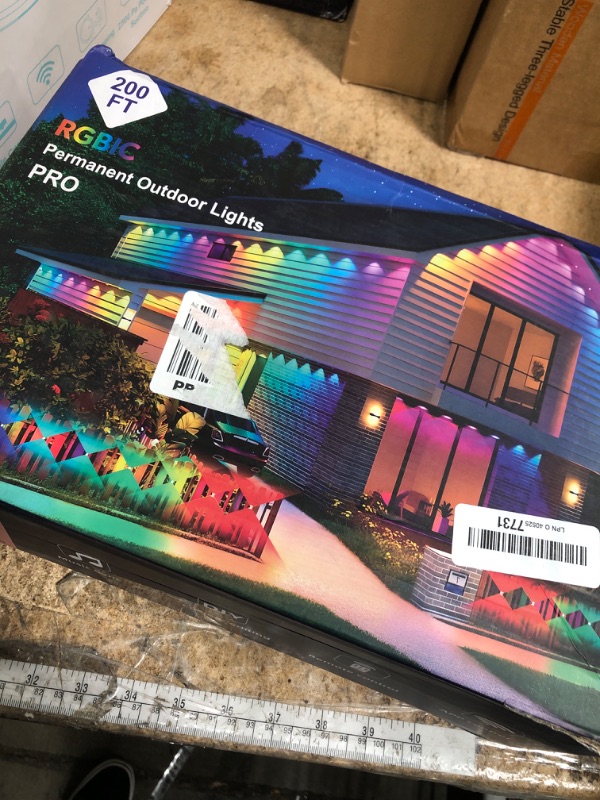 Photo 1 of **PARTS ONLY** 200 FT Permanent Outdoor Lights, Waterproof 2-in-1 Eaves & Ground Stakes LED String Lights with App/Remote Control for House, Garden– Smart Color-Changing Lighting for Halloween Christmas Decorations