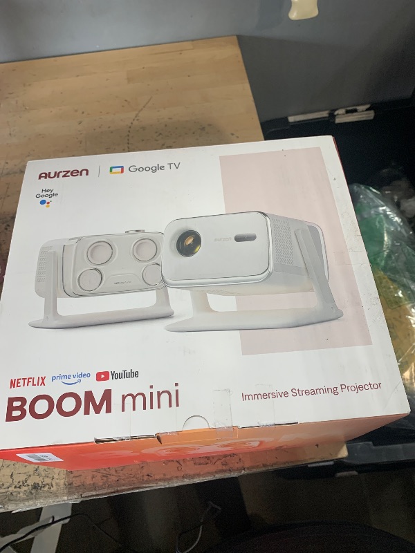 Photo 1 of Aurzen BOOM mini Google TV 4K Supported Smart Projector with WiFi and Bluetooth, Outdoor & Home Movie Projector with 20W Speakers DoIby Audio, Real-Time Focus & Keystone, 500 ANSI Lumens, Off-white