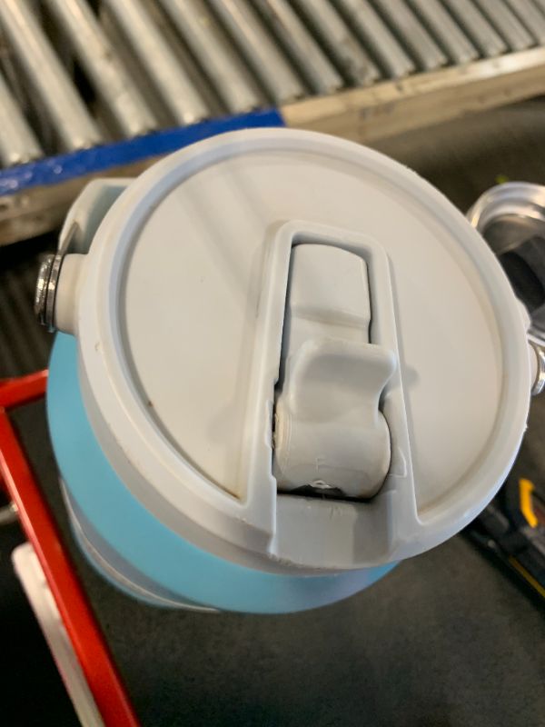 Photo 1 of *Item Is Dirty - Check clerk notes* Stanley IceFlow Flip Straw Jug with Handle 64 oz| Twist On Lid and Flip Up Straw | Leak Resistant for Travel and Sports | Insulated Stainless Steel | BPA-Free | Pool
**see photo of damage**