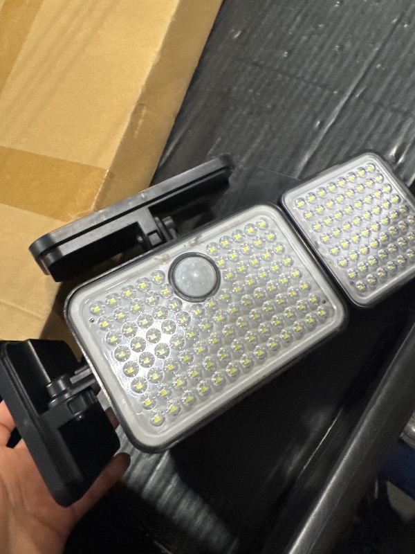 Photo 1 of **MISSING REMOTE**JACKYLED Solar Lights for Outside, 304 LED 8500K Motion Sensor Outdoor Light, 4 Adjustable Heads 3 Mode Solar Flood Lights, IP65 Waterproof LED Security Lights for Yard Patio Wall (2 Pack)