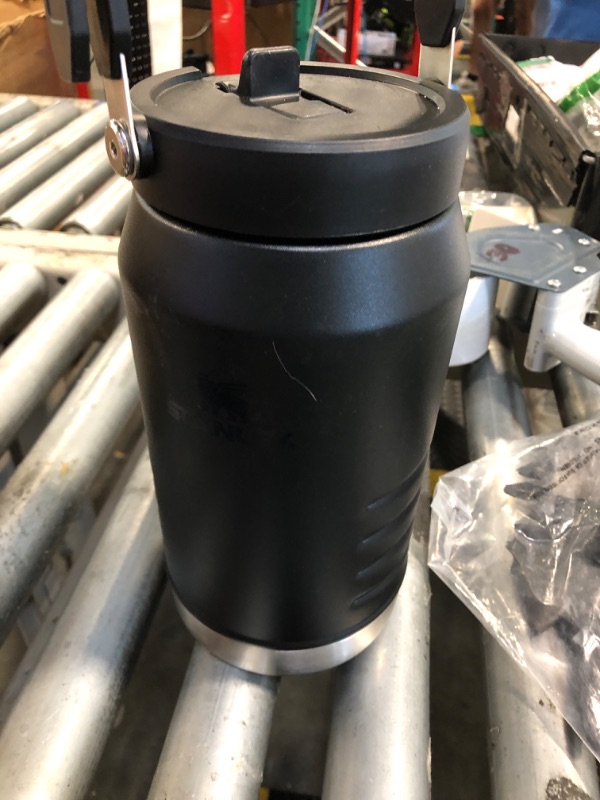 Photo 1 of ** USED** Stanley IceFlow 2.0 Flip Straw Jug with Handle 64 oz | Twist On Lid and Flip Up Straw | Leakproof for Travel and Sports | Insulated Stainless Steel | BPA-Free | Black 2.0