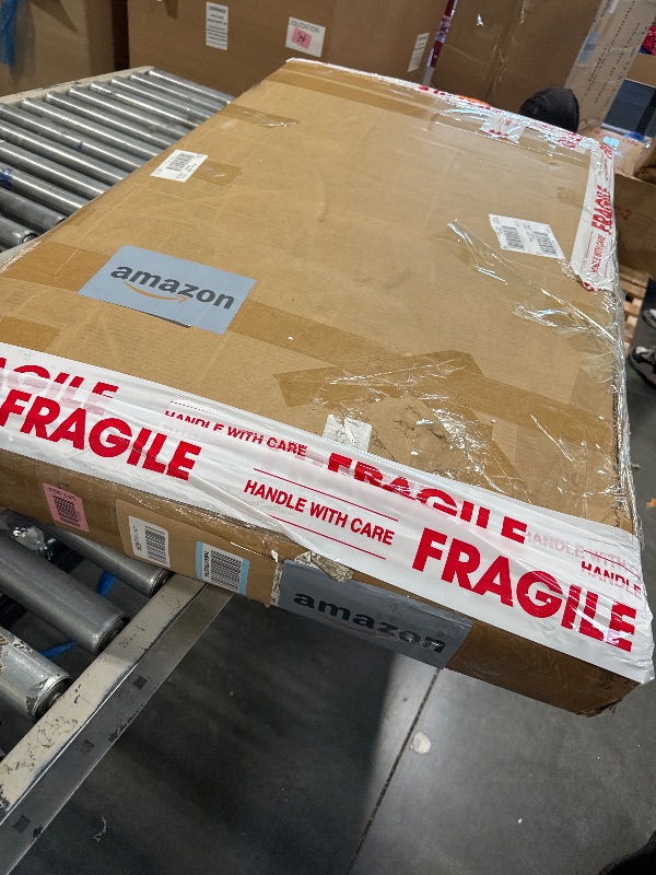 Photo 1 of ** USED / HARDWARE COMPLETED ** GAOMON Coffee Table for Living Room, Faux Marble Coffee Table with 4 Drawers and Glass Doors Storage, Modern Aesthetic Fluted Panel Design,Black & Gold