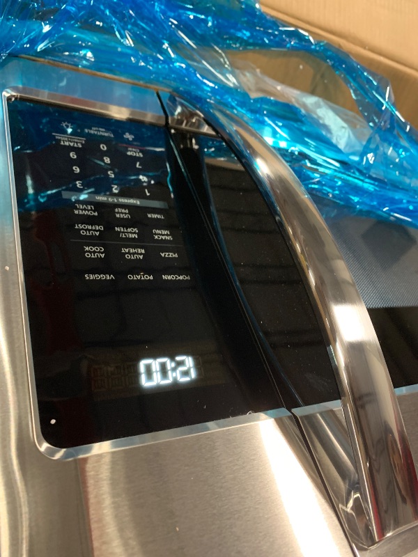 Photo 1 of ** NEW / TESTED FUNCTIONAL**  BLACK+DECKER EM044KB19 Over The Range Microwave Oven with One Touch, 1000 Watts, 400 CFM and Auto Cooking, OTR 1.9 Cu.ft