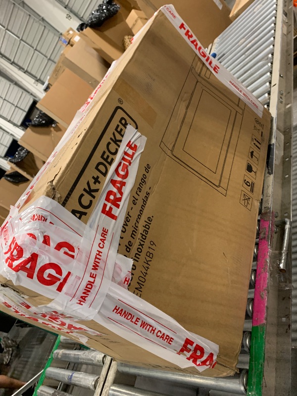 Photo 1 of ** NEW / TESTED FUNCTIONAL**  BLACK+DECKER EM044KB19 Over The Range Microwave Oven with One Touch, 1000 Watts, 400 CFM and Auto Cooking, OTR 1.9 Cu.ft