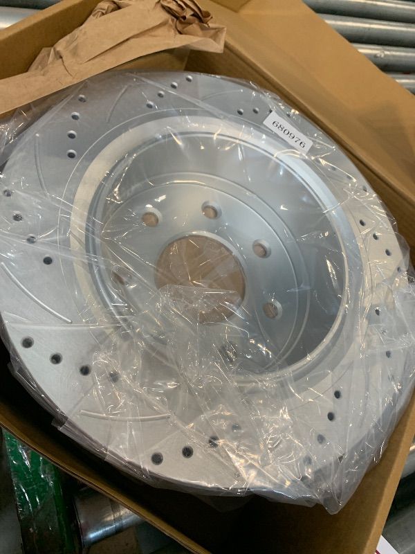 Photo 1 of ** NEW / COMPLETE/ NO RETURNS ** 7-Lug Rear Disc Brakes and Rotors Geomet Drilled Slotted Replace for 12-14 Ford F-150, 12-13 Ford Lobo, Heavy Duty Payload: 680977, 19306767, 18A2918, BRRF-208, BRRF-289, CL3Z-2C026-B, CL3Z-2C026-E
