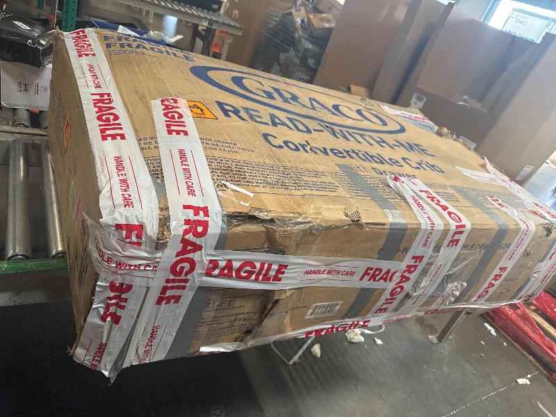 Photo 1 of ** VERY USED** Graco Read-with-Me 4-in-1 Convertible Crib with Drawer (White with Driftwood) - GREENGUARD Gold Certified Converts to Toddler Bed, Daybed, and Functional Bookshelves