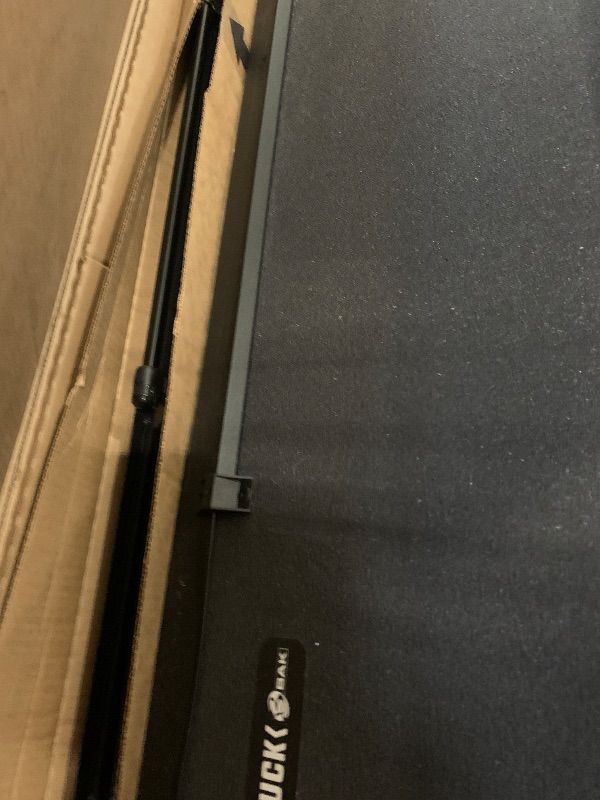 Photo 1 of ** USED ** RealTruck BAK BAKFlip MX4 Hard Folding Truck Bed Tonneau Cover | 448130 | Fits 2019-2025 Chevy/GMC Silverado/Sierra, w/MultiPro/Flex Tailgate (Will not fit Carbon Pro Bed) 5' 10" Bed (69.9")