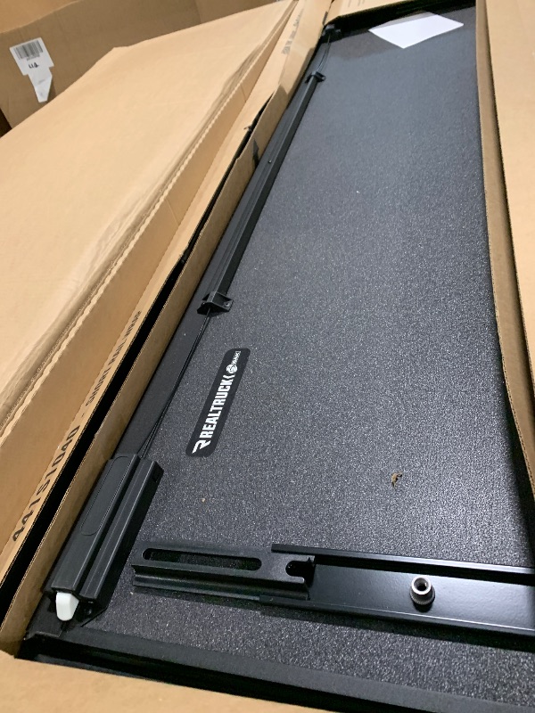 Photo 1 of ** USED ** RealTruck BAK BAKFlip MX4 Hard Folding Truck Bed Tonneau Cover | 448130 | Fits 2019-2025 Chevy/GMC Silverado/Sierra, w/MultiPro/Flex Tailgate (Will not fit Carbon Pro Bed) 5' 10" Bed (69.9")