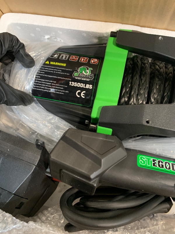 Photo 1 of ** NEW** STEGODON Winch 13500 lb Winch 12V Waterproof Electric Winch Synthetic Rope Winch Off Road Winches with 2 in 1 Wireless Remote for Towing Jeep Truck Off Road (Jungle EX)