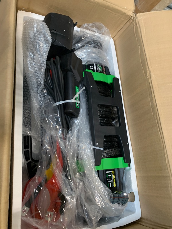 Photo 1 of ** NEW** STEGODON Winch 13500 lb Winch 12V Waterproof Electric Winch Synthetic Rope Winch Off Road Winches with 2 in 1 Wireless Remote for Towing Jeep Truck Off Road (Jungle EX)