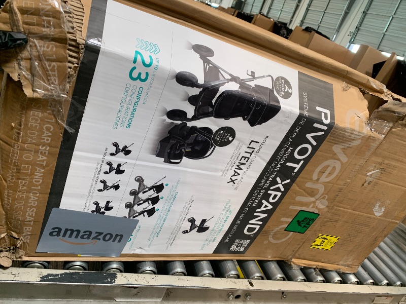 Photo 1 of ** NEW ** Evenflo Pivot Xpand Modular Travel System with LiteMax Infant Car Seat (Ayrshire Black)