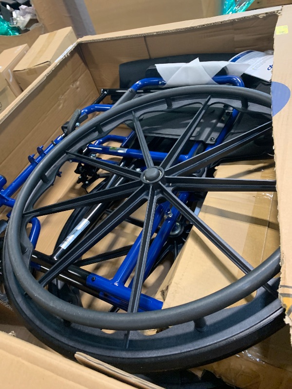 Photo 1 of ** NEW** Drive Medical Blue Streak Wheelchair with Flip Back Desk Arms, Swing Away Footrests,FoldingDesk Length Arms, Alloy Steel, 20 Inch Seat