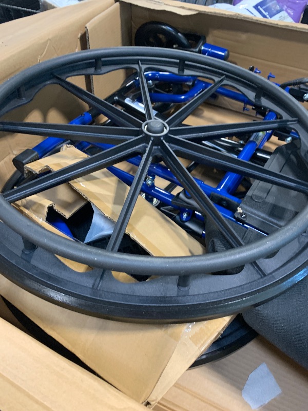 Photo 1 of ** NEW** Drive Medical Blue Streak Wheelchair with Flip Back Desk Arms, Swing Away Footrests,FoldingDesk Length Arms, Alloy Steel, 20 Inch Seat