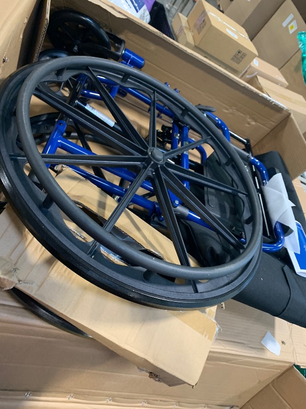 Photo 1 of ** NEW** Drive Medical Blue Streak Wheelchair with Flip Back Desk Arms, Swing Away Footrests,FoldingDesk Length Arms, Alloy Steel, 20 Inch Seat