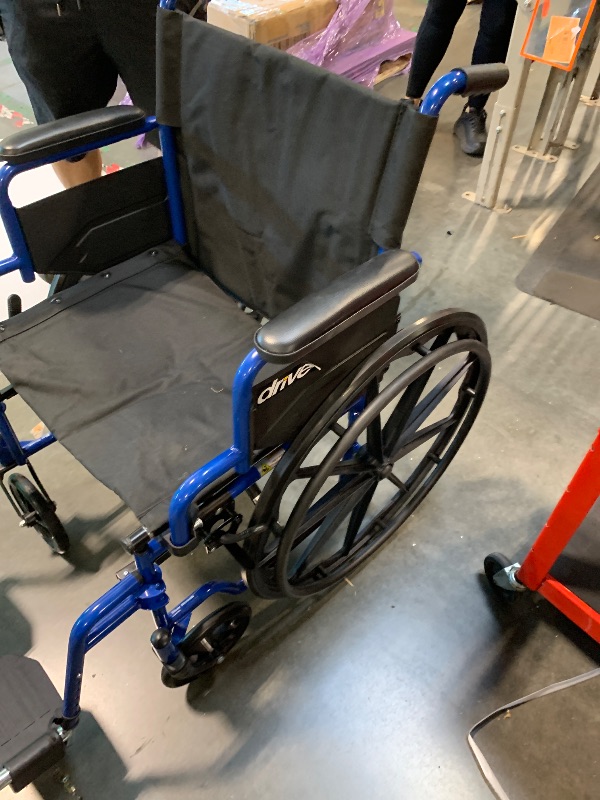 Photo 1 of ** USED / TESTED FUNCTIONAL ** Drive Medical Blue Streak Wheelchair with Flip Back Desk Arms, Swing Away Footrests,FoldingDesk Length Arms, Alloy Steel, 20 Inch Seat