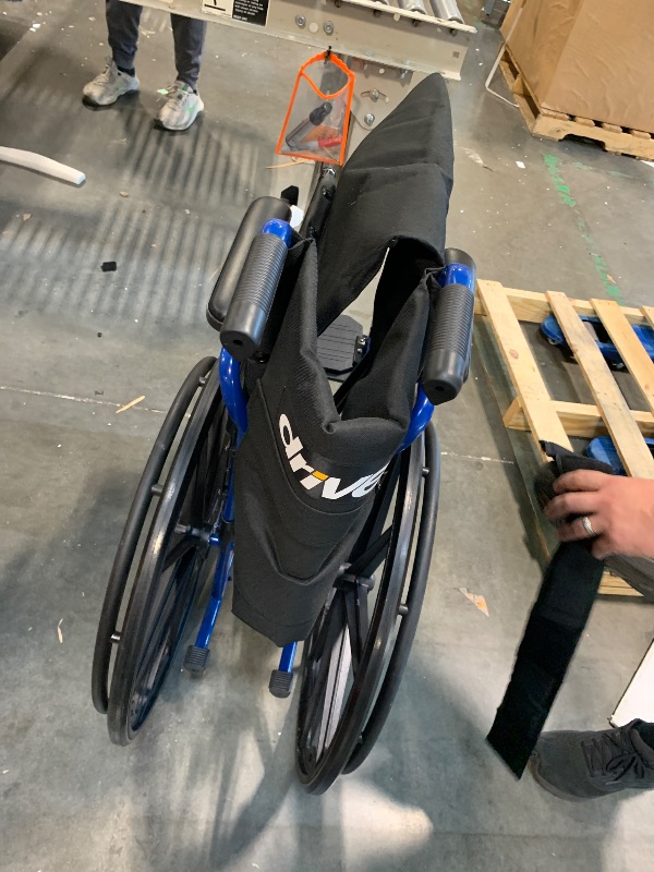 Photo 1 of ** USED / TESTED FUNCTIONAL ** Drive Medical Blue Streak Wheelchair with Flip Back Desk Arms, Swing Away Footrests,FoldingDesk Length Arms, Alloy Steel, 20 Inch Seat