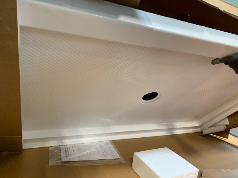 Photo 1 of ** NEW ** DreamLine SlimLine 32 in. D x 42 in. W x 2 3/4 in. H Center Drain Single Threshold Shower Base in White, DLT-1132420