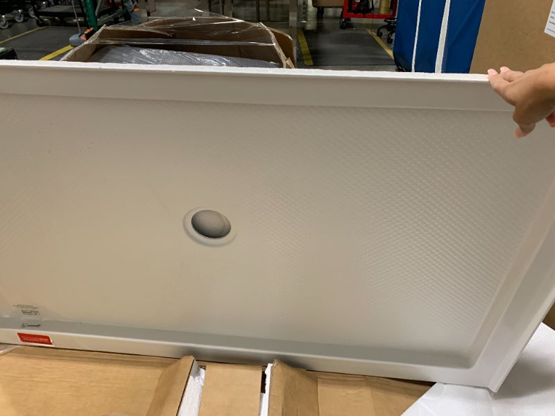 Photo 1 of ** NEW ** DreamLine SlimLine 32 in. D x 42 in. W x 2 3/4 in. H Center Drain Single Threshold Shower Base in White, DLT-1132420