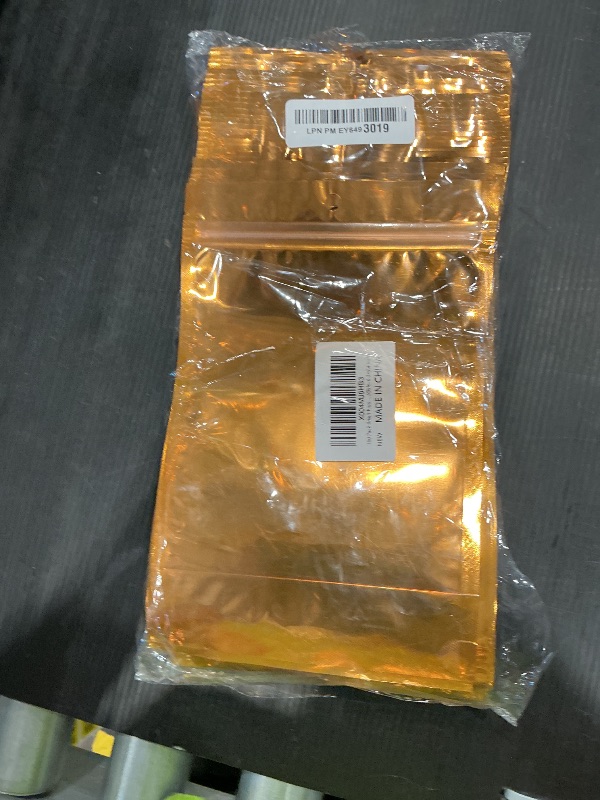 Photo 1 of 100 Pack Smell Proof Bags, Resealable Mylar Bag with Clear Window, Foil Pouch Stand-up for Food Self Sealing Storage, Scratch Resistant Hand Storage. (Gold, 6.3×9.4 inch)