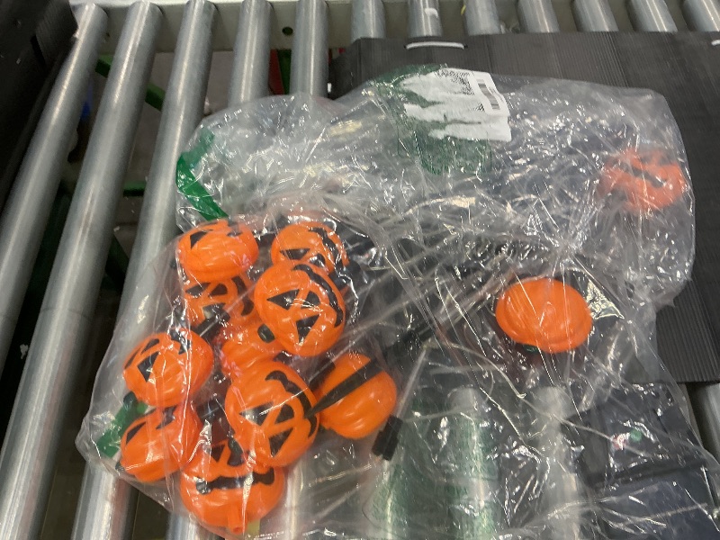 Photo 1 of 12 Pack Solar Pumpkin Lights for Halloween Decorations Outdoor, Waterproof Halloween Pathway Lights with 8 Modes, Orange Purple and Green Halloween Walkway Stake Lights for Yard Garden Party Decor