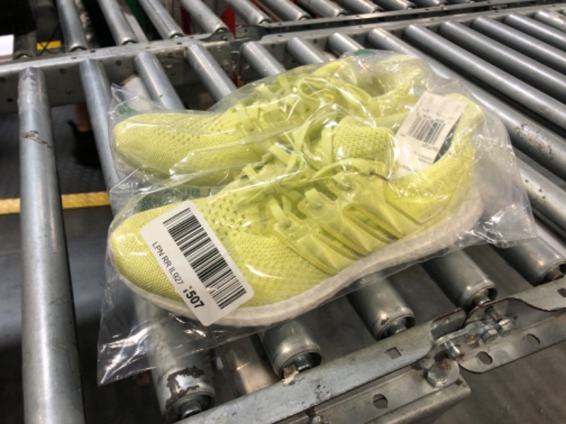 Photo 1 of **Dirty** adidas Men's Ultraboost 5.0 DNA Running Shoes (10, Pulse Yellow/Pulse Yellow/White, Numeric_10)