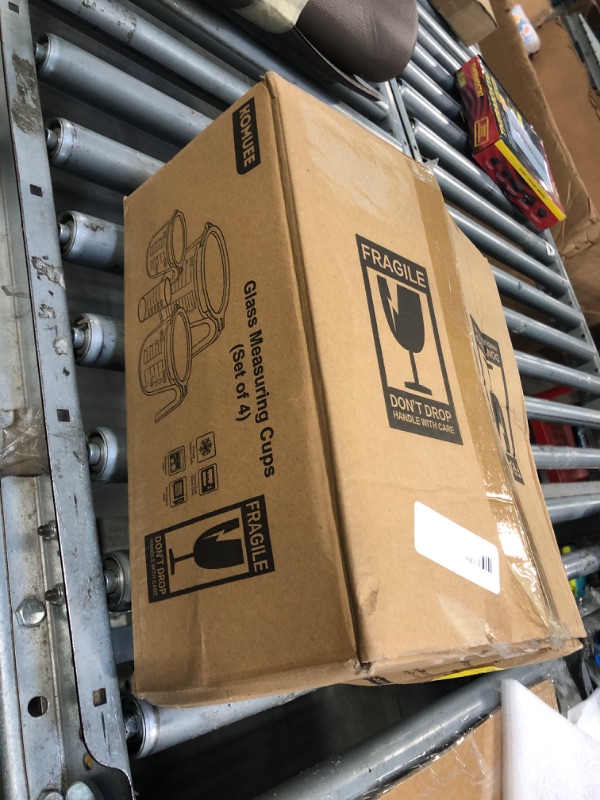 Photo 1 of **3 pieces**KOMUEE 4 Piece Glass Measuring Cups Set, 5 Oz, 1-Cup, 2-Cup, 4-Cup Liquid Measuring Cups with Lids for Kitchen, Freezer and Microwave Safe