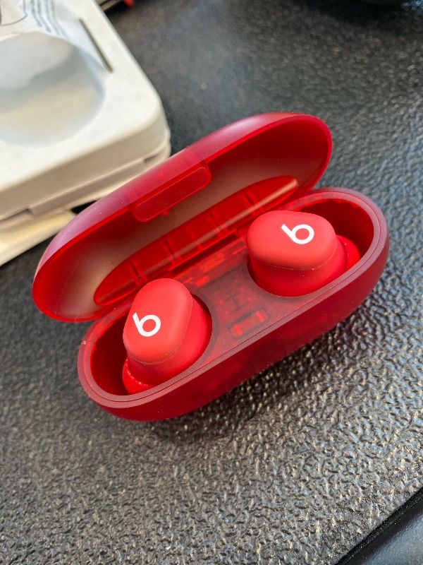 Photo 1 of *Minor Damaged*
Beats Solo Buds - Wireless Bluetooth Earbuds | 18 Hours of Battery Life | Apple & Android Compatibility | Built-in Microphone - Transparent Red