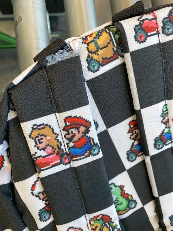 Photo 1 of *Minor Damaged - Check clerk notes*
Bioworld Super Nintendo Mario Kart 8-Bit Character Checkered Travel Laptop Backpack