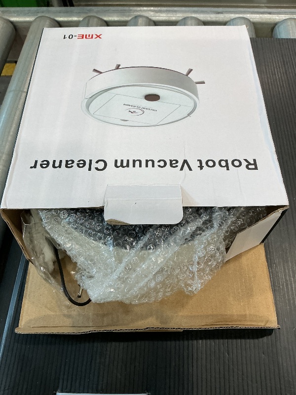 Photo 1 of ***READ CLERK NOTES*** 3-in-1 Robot Vacuum and Mop | 3000Pa Strong Suction, Anti-Tangle, 120 Mins Runtime, Ultra-Thin, Low Noise, Smart Navigation, Multiple Cleaning Modes, Ideal for Pet Hair and Hard Floors (White)?
