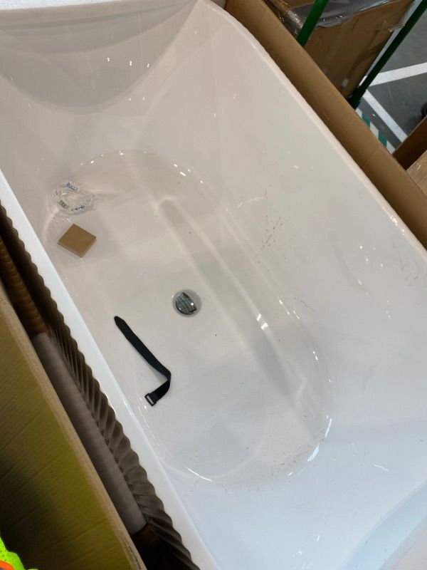 Photo 1 of *Minor Damage - See clerk notes*
67" Acrylic Freestanding Bathtub with Textured Stripes, Deep Soak Tub, Space-Saving, Glossy Surface, Luxury Spa Design for Modern Bathrooms