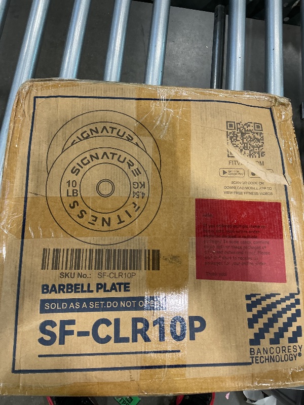 Photo 1 of 10 pound barbell plate set