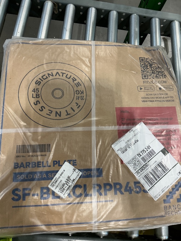 Photo 1 of *USED*
45 pound barbell Bumper plate