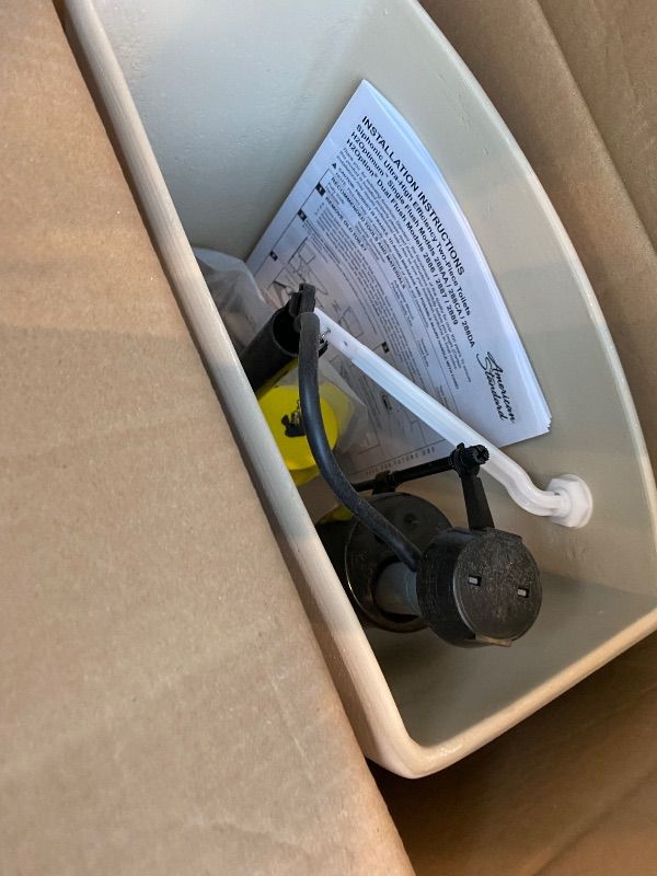 Photo 1 of *Unknown if misssing items* American Standard 288CA114.020 H2Optimum Two-Piece Toilet, Elongated Front, Standard Height, White, 1.1 gpf